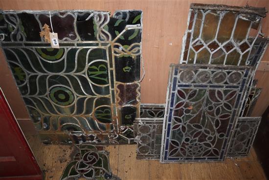 Twenty Victorian and later stained glass panels Largest 65 x 88cm
